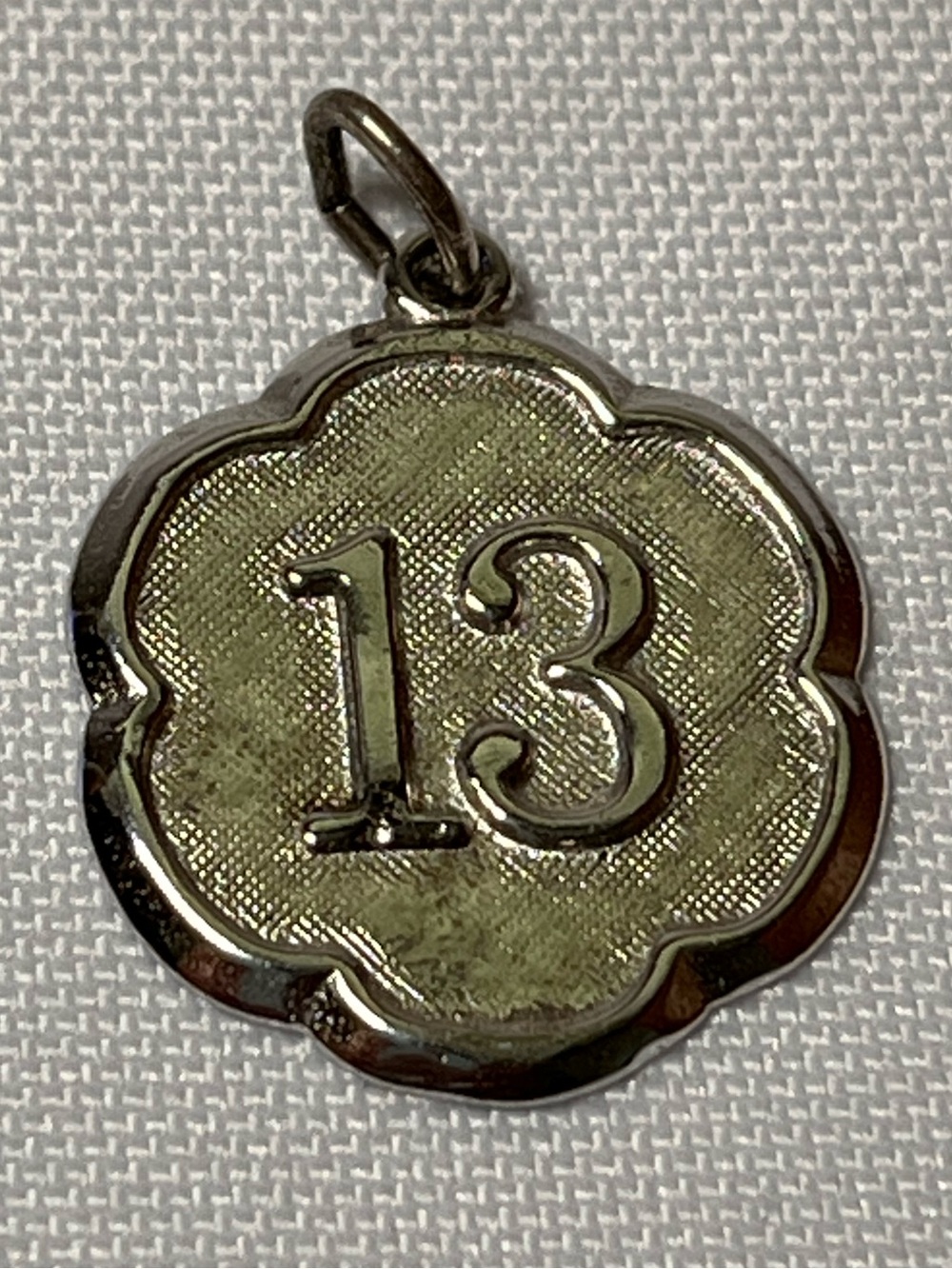 Vintage Sterling Silver '13' Medallion Charm
Collectible